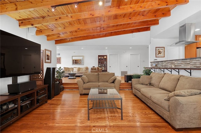 living room with vaulted ceiling with beams, light wood-type flooring, and wooden ceiling