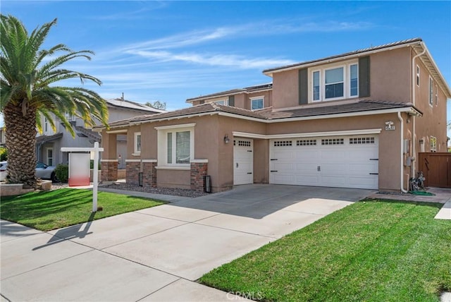 view of front of property with a front yard, fence, and stucco siding