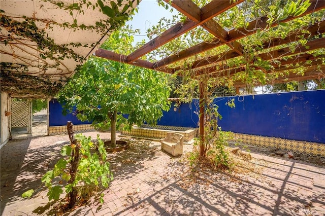 view of patio / terrace featuring a pergola