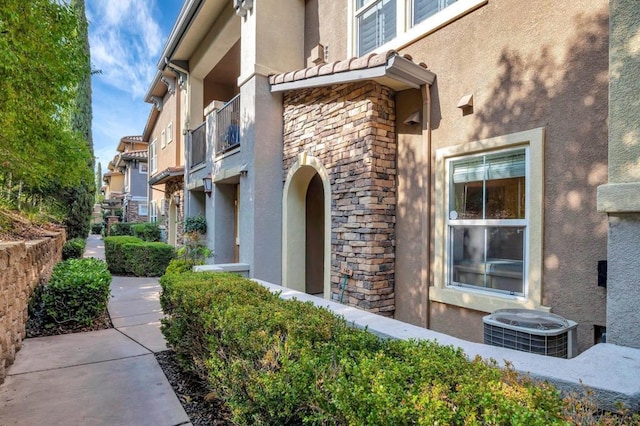 exterior space featuring central AC unit