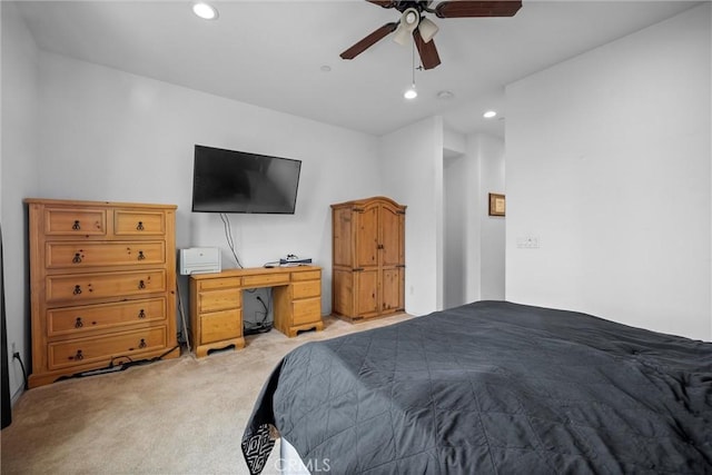 carpeted bedroom featuring ceiling fan