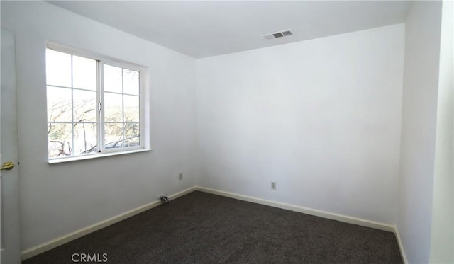 view of carpeted spare room