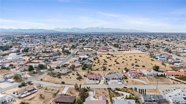 bird's eye view with a mountain view