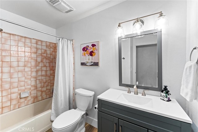 full bathroom featuring vanity, toilet, and shower / bath combo