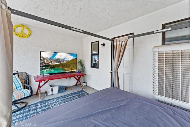 bedroom featuring a textured ceiling