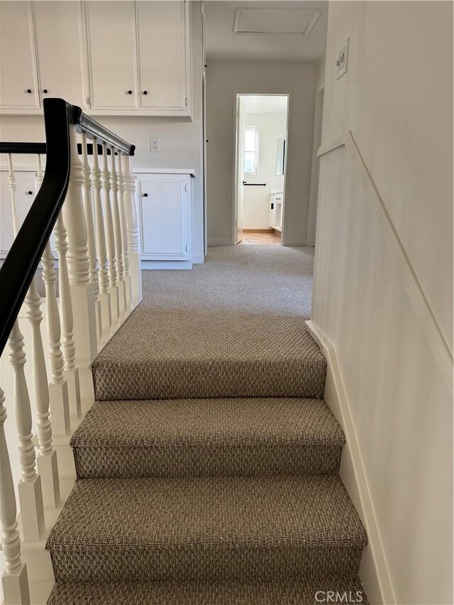 stairway with carpet floors