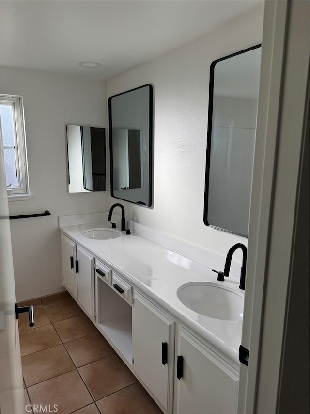 bathroom featuring tile patterned floors and vanity