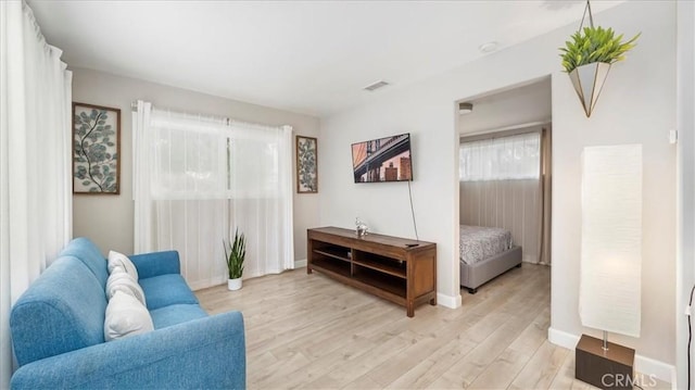 living room with light wood-type flooring