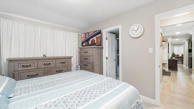 bedroom featuring light wood-type flooring