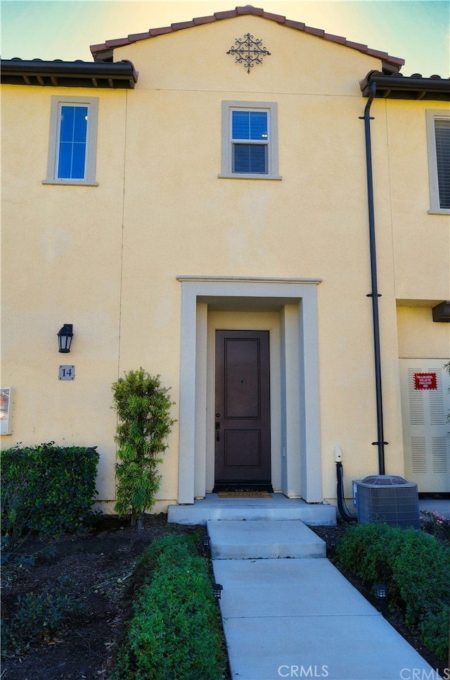 entrance to property with cooling unit