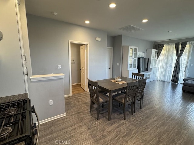 dining room featuring dark hardwood / wood-style floors