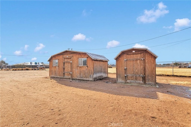 view of outdoor structure featuring a rural view