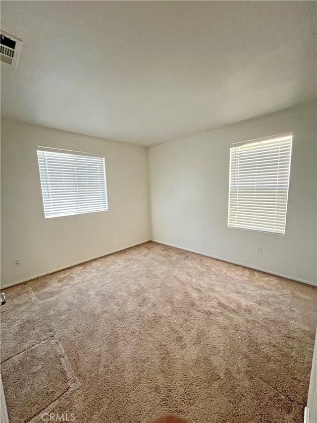 view of carpeted spare room