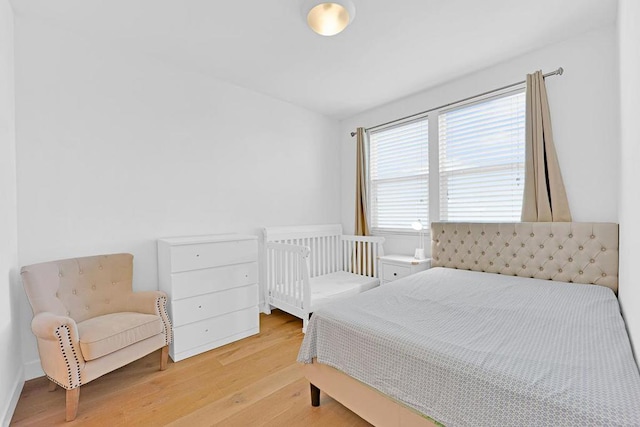 bedroom featuring light wood-type flooring