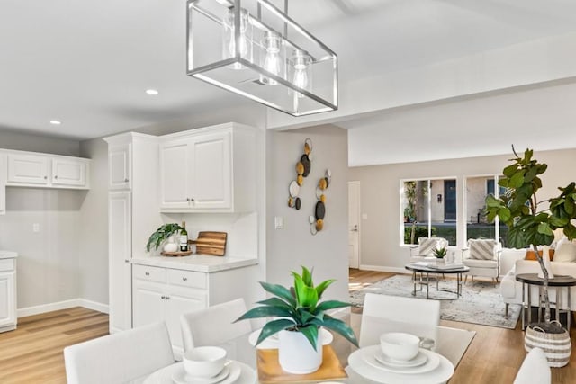 dining area with light wood-type flooring