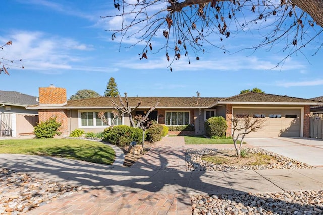 ranch-style house with a garage and a front yard