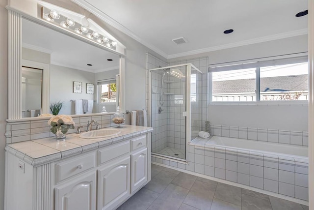 bathroom with crown molding, tile patterned floors, vanity, and independent shower and bath