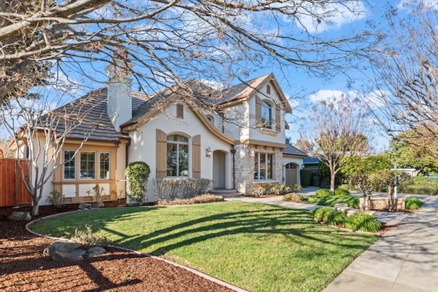 view of front of home featuring a front lawn