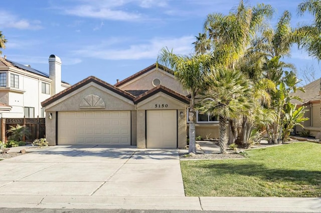 view of front facade featuring a front yard