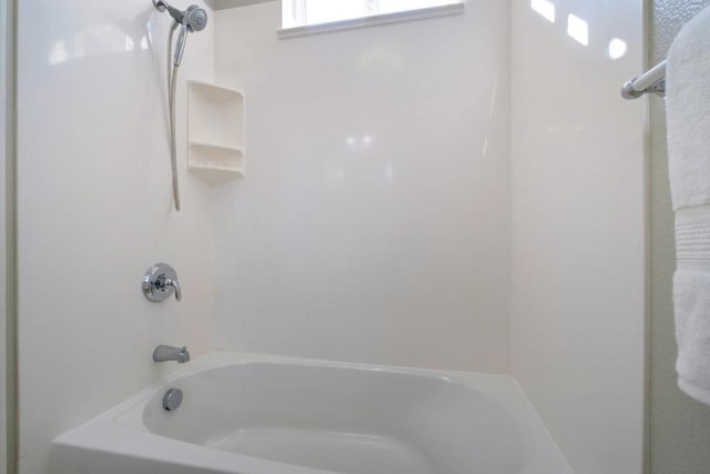 bathroom featuring shower / washtub combination