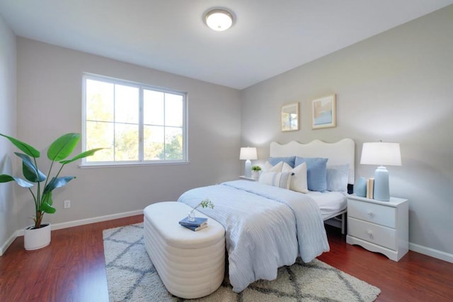 bedroom featuring dark hardwood / wood-style floors