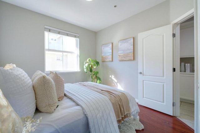 bedroom featuring dark hardwood / wood-style floors