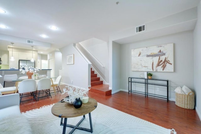 living room with dark wood-type flooring