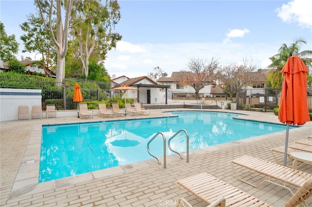 view of pool featuring a patio