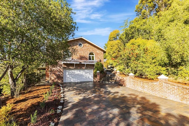 view of front of property with a garage