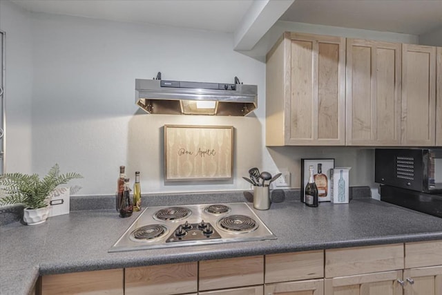 kitchen featuring gas cooktop and light brown cabinets