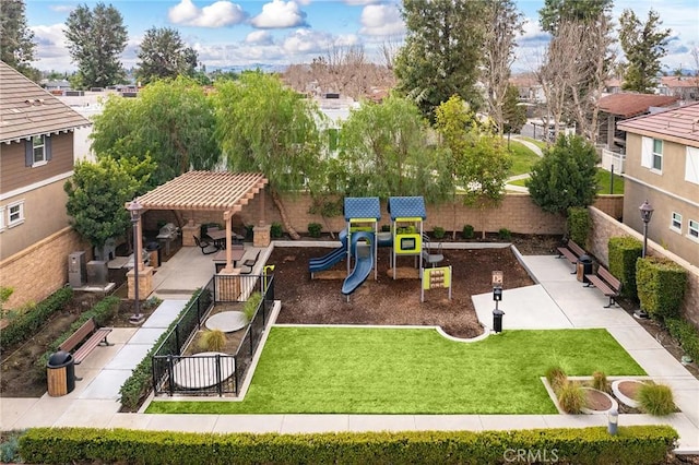 view of play area featuring a lawn