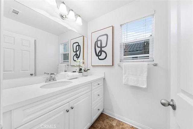 bathroom featuring vanity