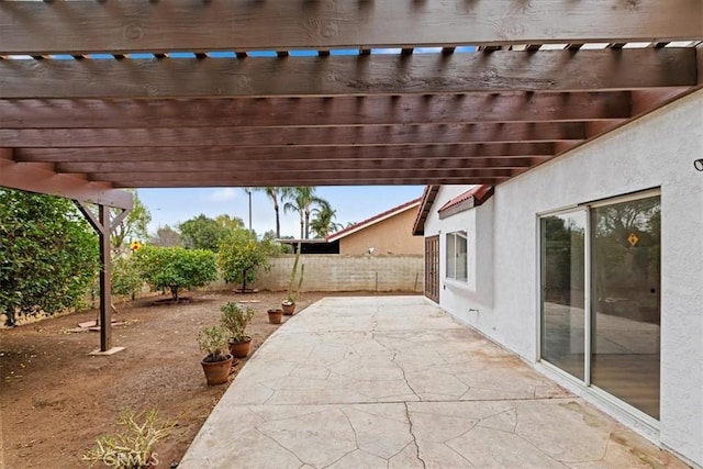 view of patio featuring a pergola