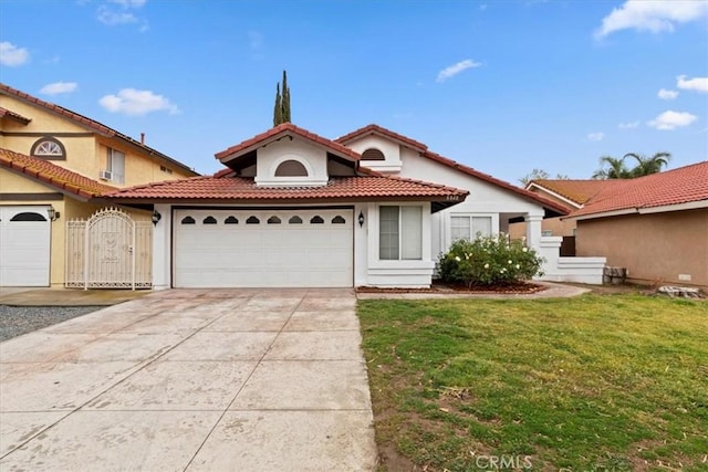 mediterranean / spanish-style house featuring a front yard