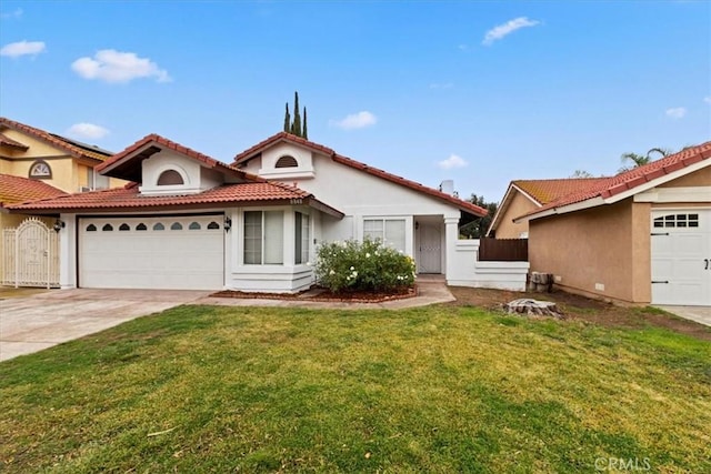 view of front of house featuring a garage and a front yard