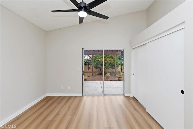 empty room featuring ceiling fan and light hardwood / wood-style floors