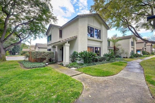 view of front of home featuring a front lawn