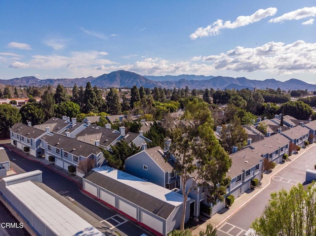 drone / aerial view featuring a mountain view