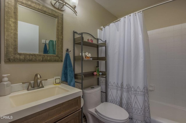 full bathroom featuring toilet, vanity, and shower / bathtub combination with curtain