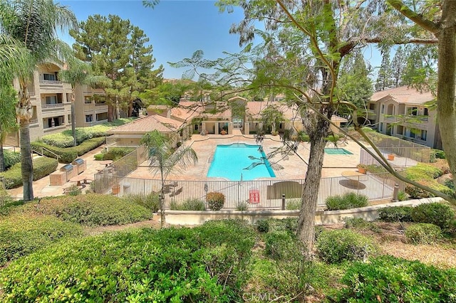 view of swimming pool featuring a patio area