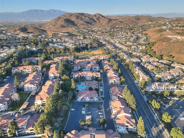 birds eye view of property featuring a mountain view