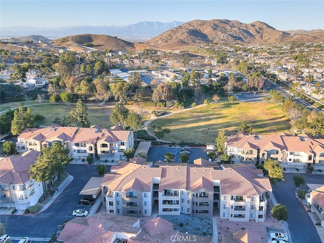 birds eye view of property featuring a mountain view