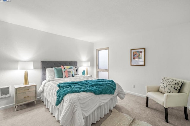 bedroom featuring light carpet