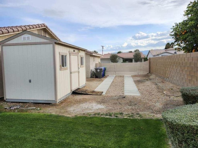 view of yard with a storage shed