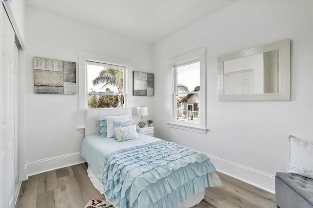 bedroom featuring light hardwood / wood-style flooring