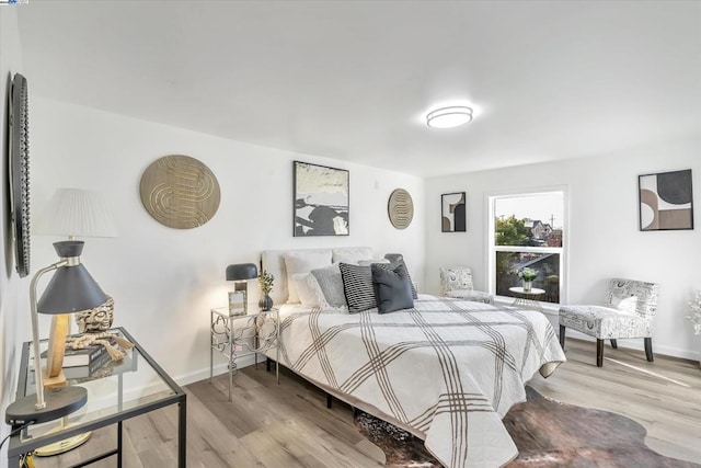 bedroom featuring hardwood / wood-style flooring