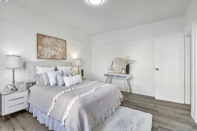 bedroom featuring hardwood / wood-style floors