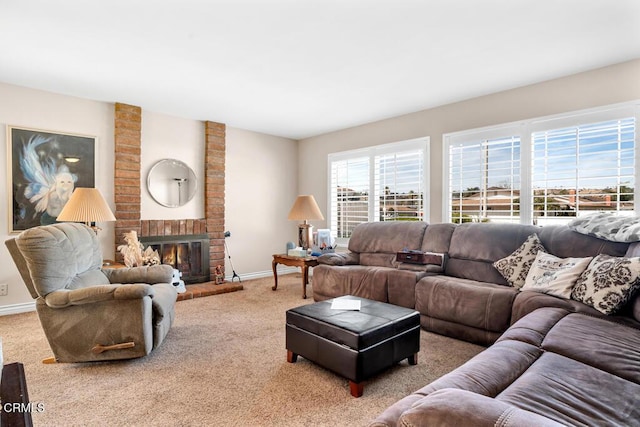 living room with carpet and a fireplace