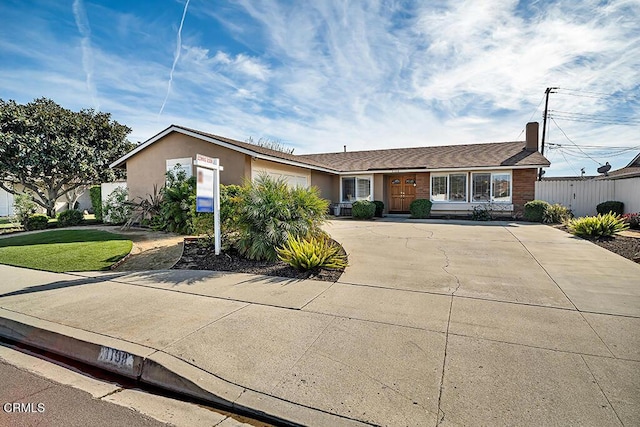 single story home with a garage