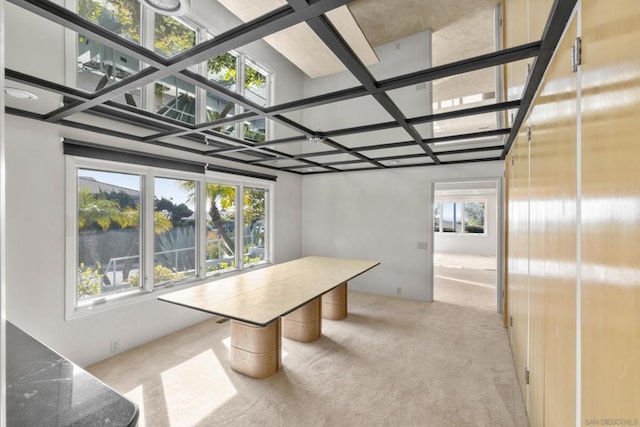 interior space with coffered ceiling